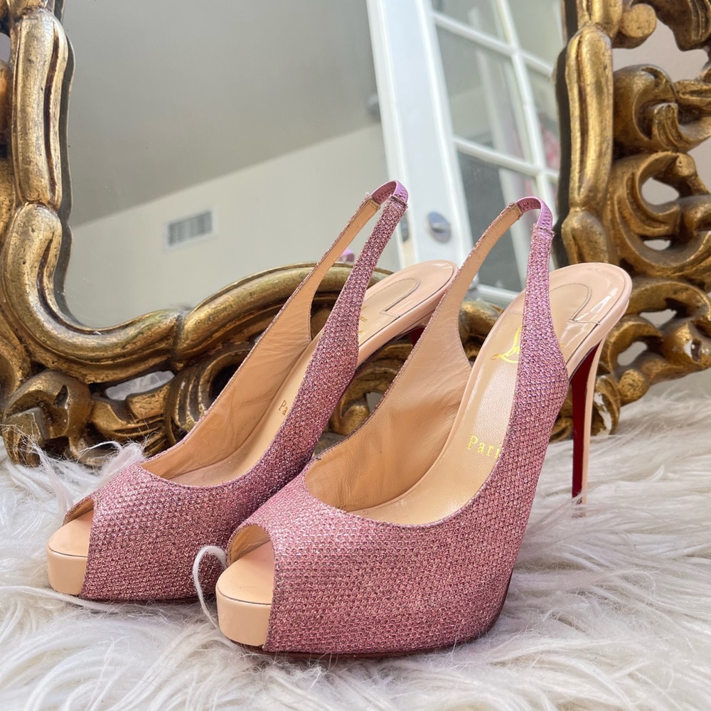 Christian Louboutins. Sparkly pink.